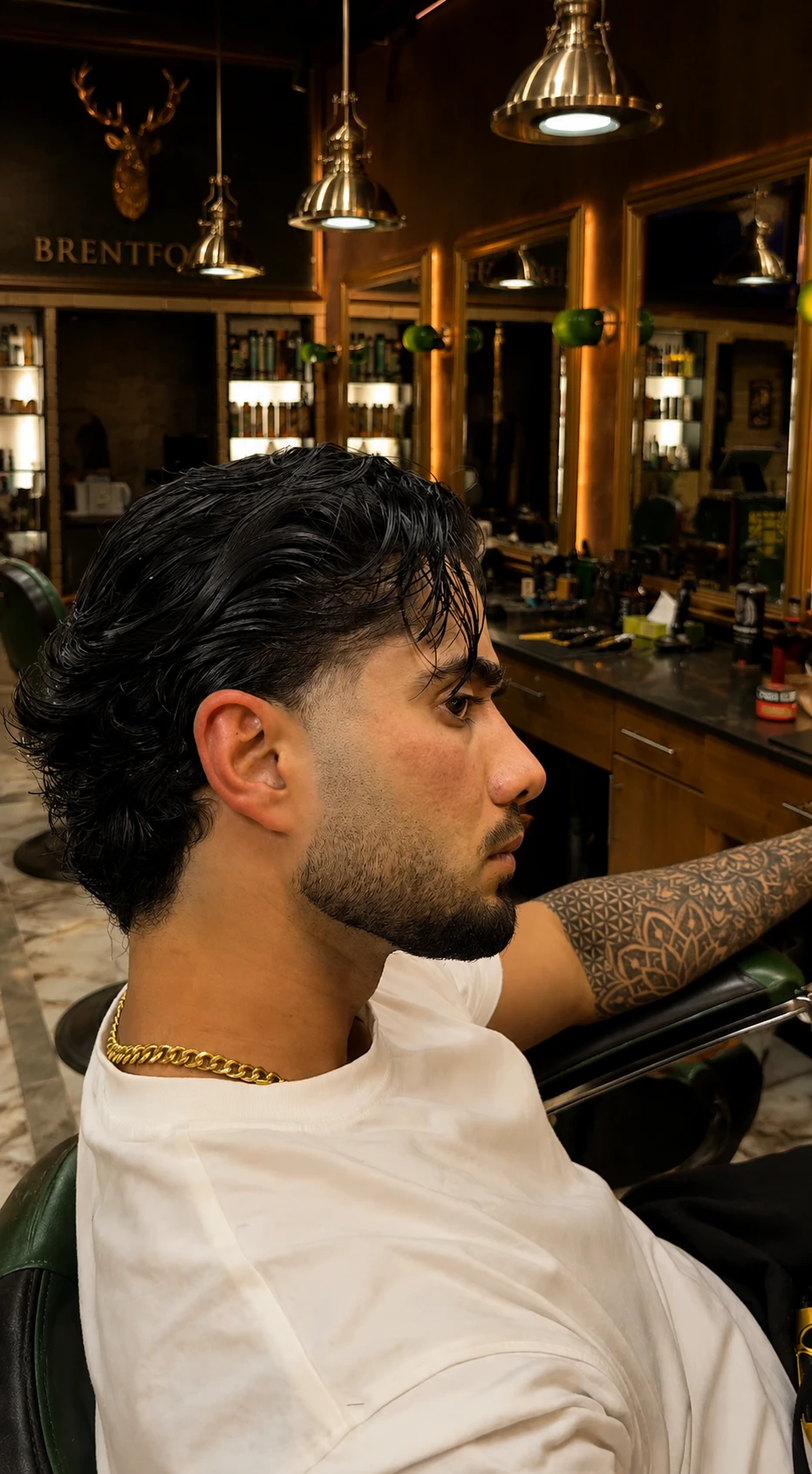 A wavy swept-back quiff, cut at Crew Barbers Brentford