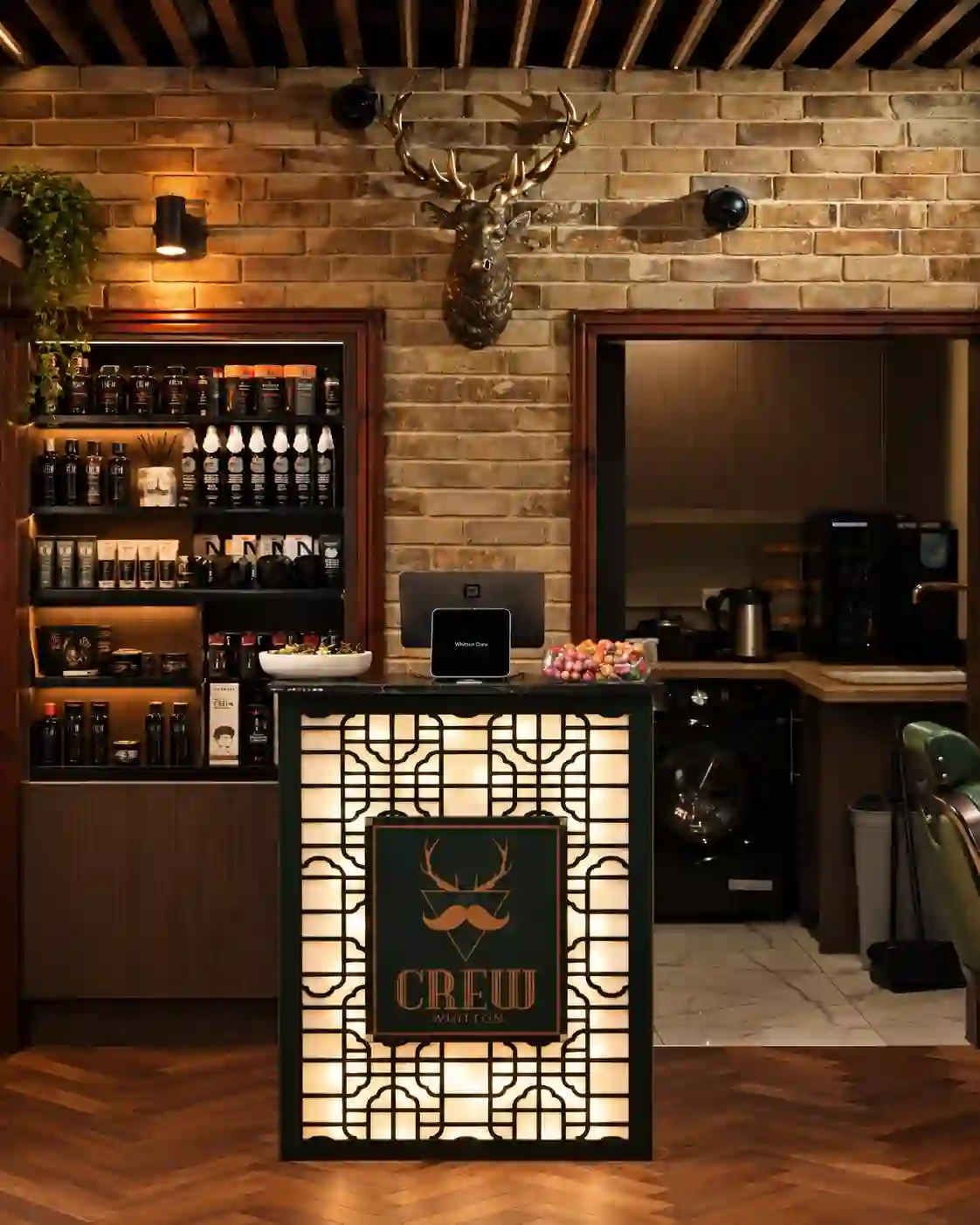 The reception desk inside Crew Barbers Whitton